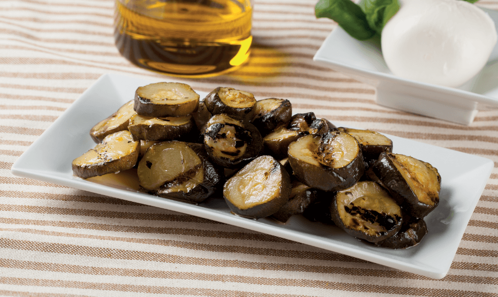 Zucchine a rondelle grigliate in olio